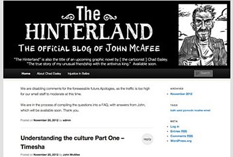 McAfee blogs about police seeking him in Belize