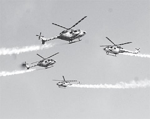 Aerobatics by Sarang choppers a week ahead of President Pratibha Patil's visit to the Air Force Technical College, Jalahalli Air Force Station.