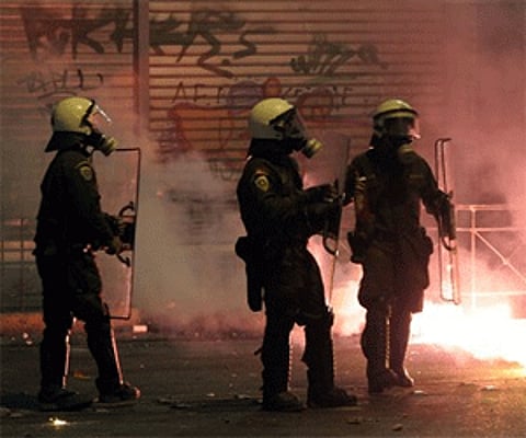 Riot police are attacked with firebombs thrown by rioters near the National Technical University of Athens Tuesday, Dec. 9, 2008 (Photo: AP)