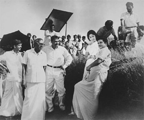 T K Pareekutty (second from left) on the sets of one of his movies starring actors Nazeer and Sheela.