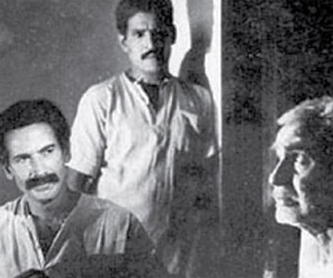 A scene from Utharayanam with Balan K Nair and Premji.