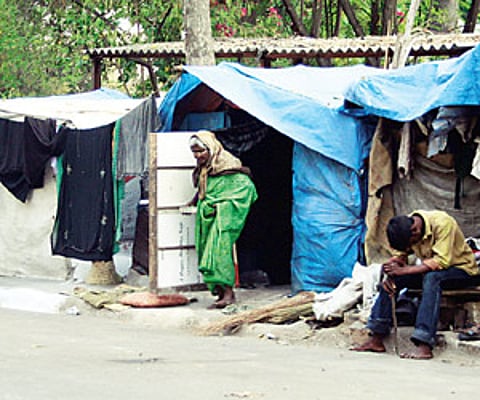 For years on end, these people have been living in the huts lining the footpaths.