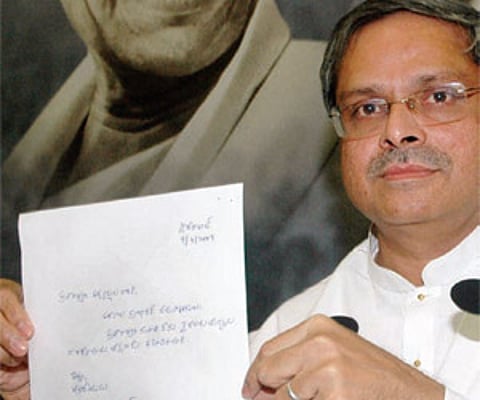 Spokesman's parting shot: Parakala Prabhakar shows his resignation letter to the media at the PRP office in Hyderabad on Thursday.