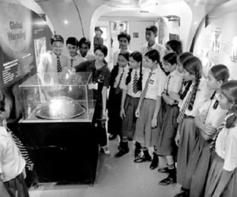 BUDDING SCIENTISTS: Students at the Science Express, the largest mobile science exhibition, aboard the train which has arrived in Bangalore.