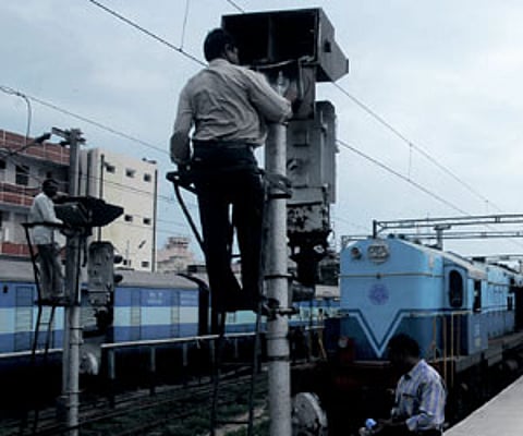 Workers fixing the signals during the 12-hour closure at Chennai Central railway station