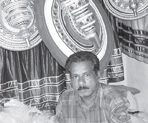 Surendran giving final touches to the headgear