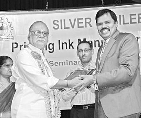 Founder-president of Printing Ink Manufacturers Association M Namasiviyam receiving the award from Anna University Dean Dr M Sekar, in the city on Sat