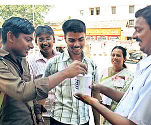 Shajar takes a coin from a well wisher