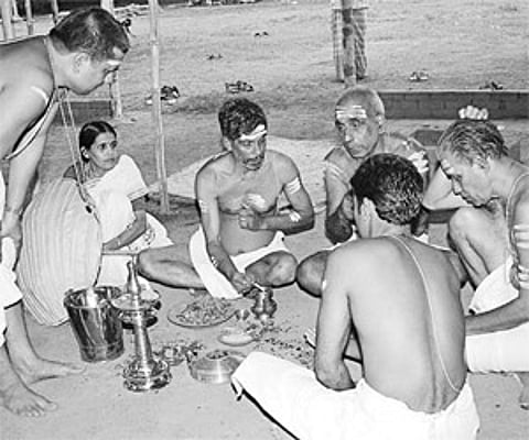 Yajamanan Kurusayoor Narayanan Namboodiripad and the yajamana pathni supervising the Punyaha ritual at the yagasala on Aluva Manalpuram on Friday.