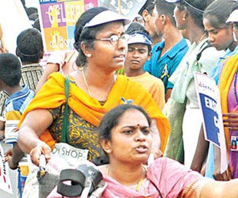 Differently-abled form human chain on Marina