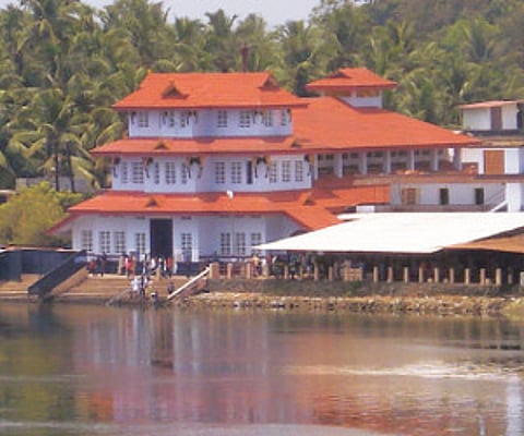 A view of the Parassinikadavu temple from the Valapattinam bridge.