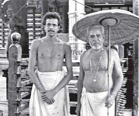 Gopalan Empranthiri, the main priest (right) and Manikantan Embranthiri, the assistant priest at the Sree Poornathrayeesha Temple
