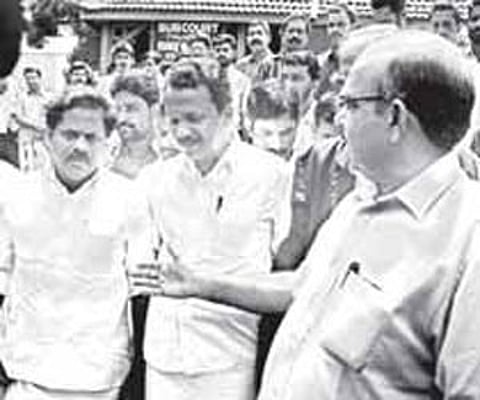 Desabhimani Kannur unit manager M Surendran (left), the first accused in the case of attempt to murder former Co-operation Minister M V Raghavan, with