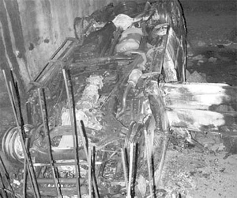 The killer vehicle at the accident site after it caught fire due to fuel leakage. The driver, however, escaped with bleeding injuries.