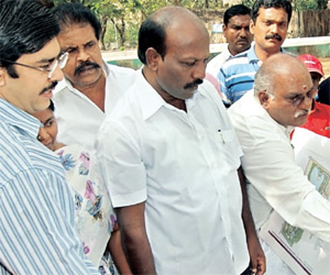 Chennai Corporation Mayor M Subramanyam inspecting the plan for the Anna Nagar Tower Park in the city on Saturday as Commisioner Rajesh Lakhoni looks