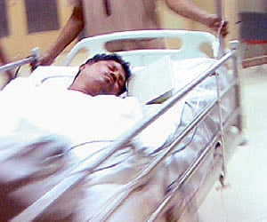 BBMP assistant engineer Somaraju, being treated in a hospital