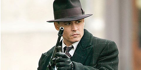 In this film publicity still released by Universal Pictures, Johnny Depp stars as legendary Depression-era outlaw John Dillinger.(AP)