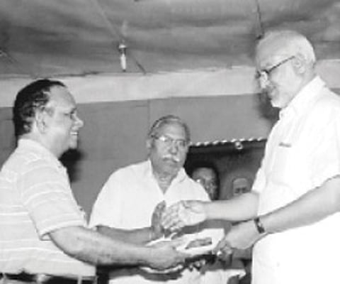 US-based engineer Girija Vallabhan handing over the donation amount for the Neyyattinkara Vasudevan Foundation to Minister for Education and Culture
