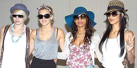 Leonardo DiCaprio has been spotted with singer Ashley Roberts of the girl group Pussycat Dolls.