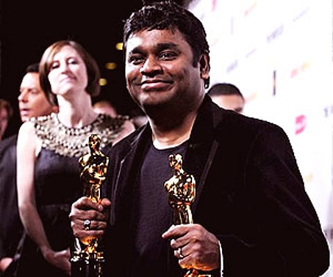 A.R. Rahman holds the Oscars for best original score and for best original song "Jai Ho" for his work on "Slumdog Millionaire" during the 81st Academy