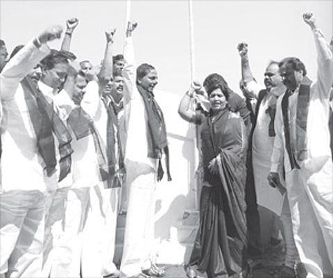 TRS president K Chandrasekhar Rao hoisting a black flag at Telangana Bhavan in Hyderabad on Sunday.