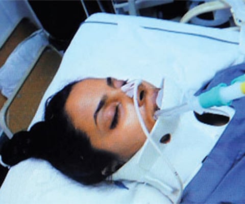 Radhika Agarwal in hospital before breathing her last. (Below) Husband Ankit Agarwal and father-in-law M L Agarwal who are absconding.