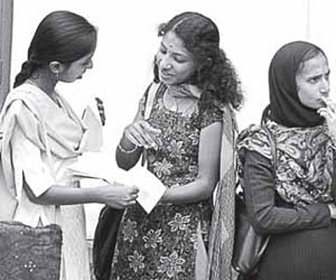 Engineering aspirants evaluating their performance after appearing for the entrance exam in Kochi on Monday/P K Jeevan Jose.
