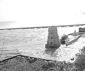 Lord Shiva temple under water at the Nagarjunasagar Pushkar ghat.