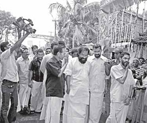 K J Yesudas being received at the Sree Pampinkavu Temple at Pampady near Thiruvilwamala on Monday.