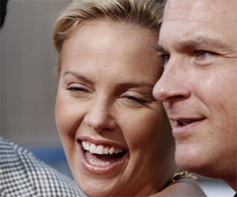 Spanish curses inspired Charlize Theron to learn Spanish