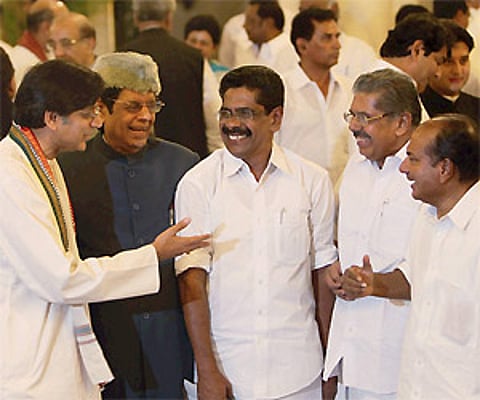 Shashi Tharoor, E Ahamed, Mulapally R, Vayalar ravi and AK Antony converse during the swearing in ceremony in New Delhi on Thursday.