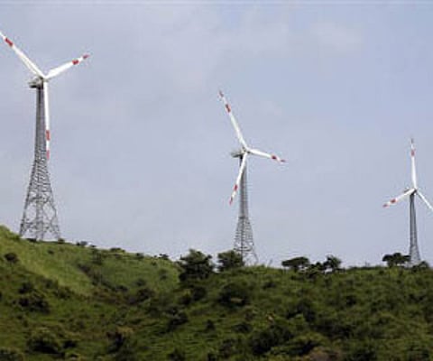 Power-generating windmill turbines are pictured in Suzlon wind farm at Sanodar village, in this September 8, 2009 (File photo/Reuters)