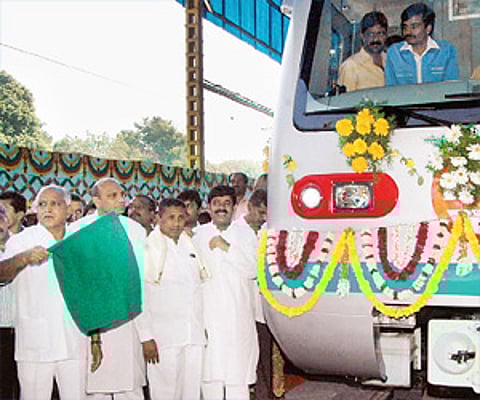Chief Minister Yeddyurappa flagging off India’s first standard gauge car for Delhi Metro at the BEML premises in Bangalore on Friday