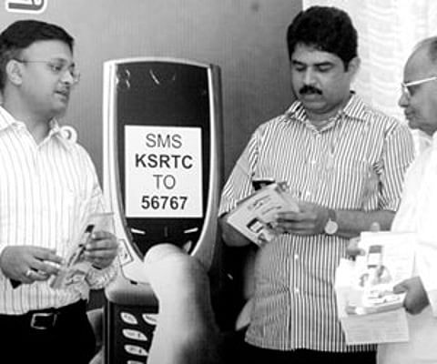 KSRTC MD Gaurav Gupta and Transport Minister R Ashok at the launch of SMS ticket booking at KSRTC central office in Bangalore.