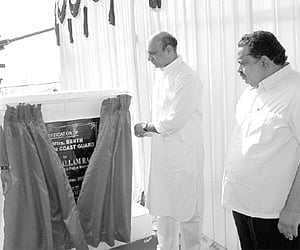 Union Minister of State for Defence M M Pallam Raju unveiling a plaque at Coast Guard station in Kakinada on Friday. KSPL Chairman K Venkateswara Rao