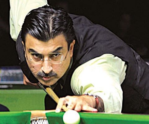 Yasin Merchant in action against Alok Kumar on Sunday.