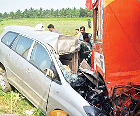 The mangled car of former DMK MLA Vasuki Murugesan that collided head on with a tanker at Sulur on Friday.