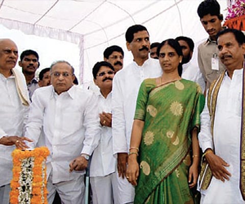 Chief Minister K Rosaiah lays the foundation stone for road widening behind Ambedkar University and Kavuri Hills on Wednesday.