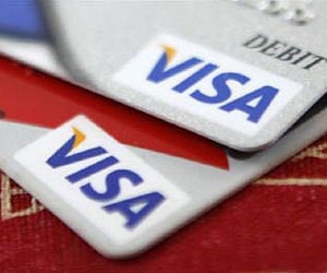 Visa credit cards are displayed in Washington October 27, 2009. (Reuters)