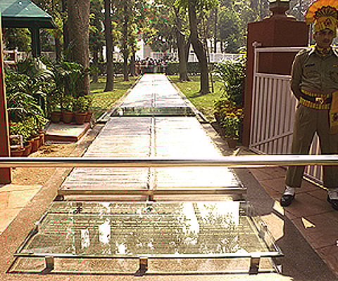 The crystal pathway where Indira Gandhi walked her last steps on Oct 31, 1984. The spot where she fell is marked by a sheet of plain glass. (IANS)