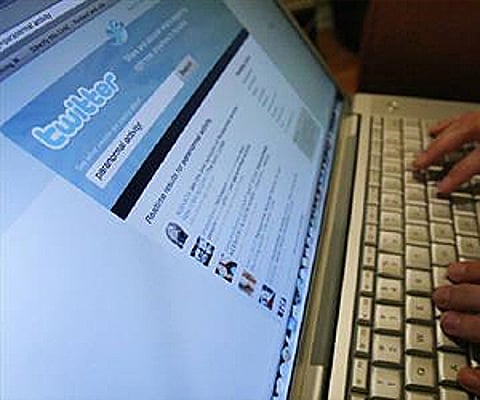 A Twitter page is displayed on a laptop computer. (File photo: Reuters)