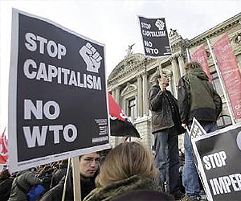 Anti-capitalism demonstrators participate during a protest against the World Trade Organisation in Geneva. (Photo: Reuters)