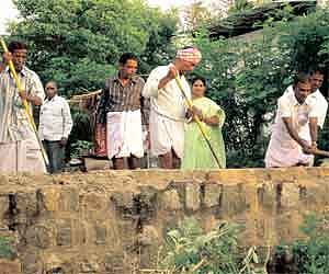 A May 6, 2008, photograph shows demolition of a portion of a wall separating Dalits and caste Hindus at Uthapuram in Madurai.