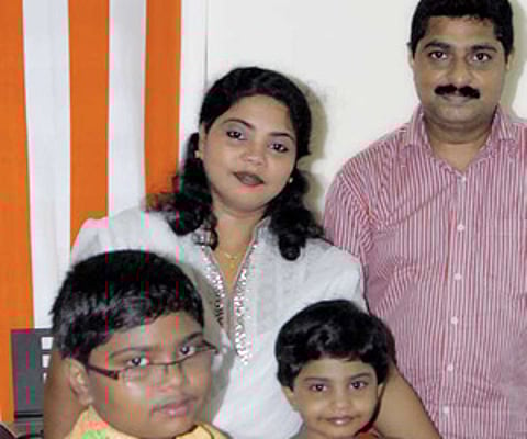 Minmini and Joy with children Allan and Keerthana Anna at the Academy.