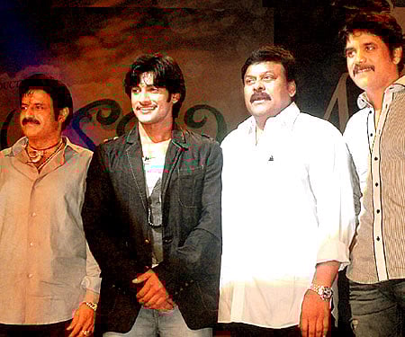 Saikumar's son Adi with Balakrishna, Chiranjeevi and Nagarjuna at the muhurat of 'Prema Kavali' (Pic: ENS)