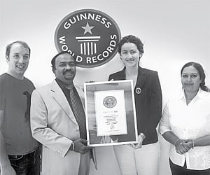 Job Pottas receiving the certificate from Andrea Banfi (Head, Adjudication) at a ceremony held at the Guinness Book Headquarters in London