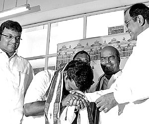 Union Home Minister P Chidambaram (right) formally admits MLA Selvaperunthagai into the Congress in the presence of TNCC president K V Thangkabalu.