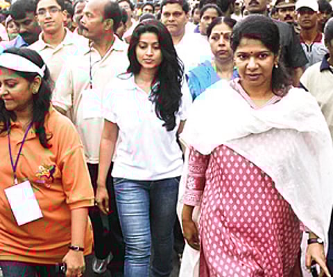 Actor Sneha and Rajya Sabha MP Kanimozhi after flagging off the Half Marathon. ENS