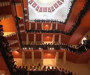 Staff of the Taj Mahal hotel stand at a renovated passageway of the heritage wing of the hotel in Mumbai. AP Photo