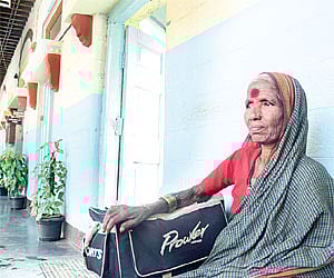 A woman checking out of her room I SURESH NAMPOOTHIRI